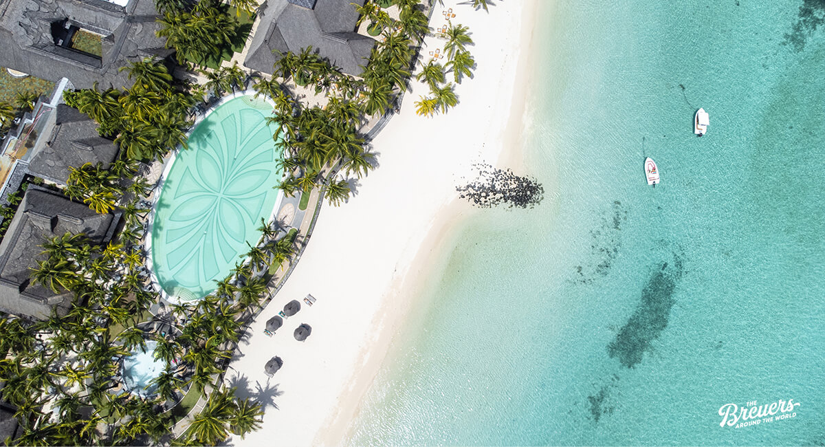 Pool und Strand vom Paradis Beach Comber auf Mauritius